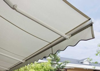 A retractable outdoor canopy roof made from polyester material.